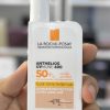 کرم ضد آفتاب لاروش پوزای رنگی مدل Anthelios SPF 50 اصل فرانسه 50 میل - LA ROCHE POSAY ANTHELIOS UVMUNE 400 INVISIBLE TINTED FLUID SPF50+ SUN CREAM 50ML