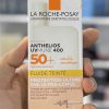 کرم ضد آفتاب لاروش پوزای رنگی مدل Anthelios SPF 50 اصل فرانسه 50 میل - LA ROCHE POSAY ANTHELIOS UVMUNE 400 INVISIBLE TINTED FLUID SPF50+ SUN CREAM 50ML